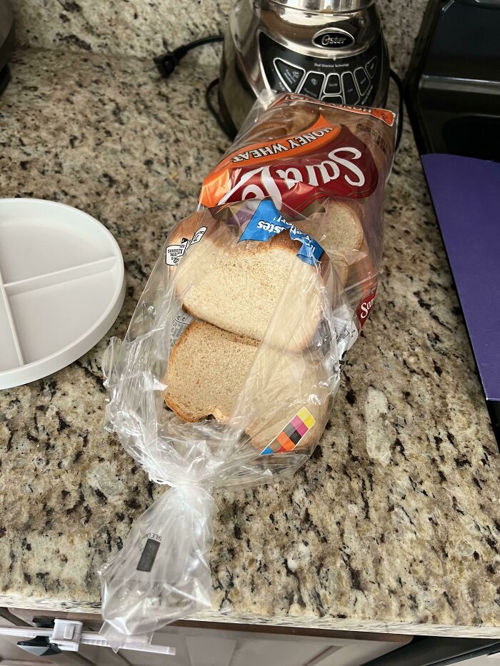 He Opened the Bread by Ripping a Hole in the Bag