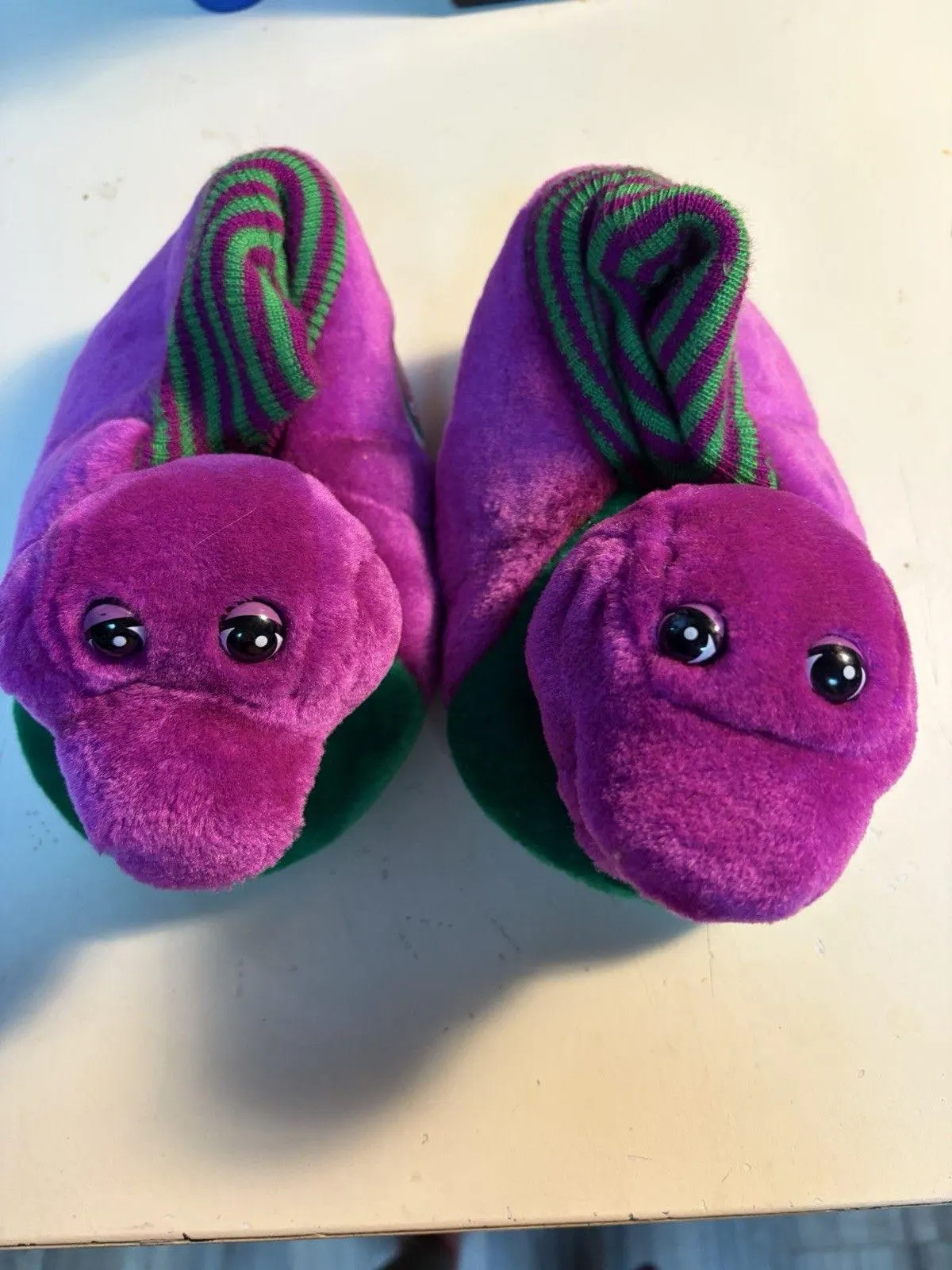 27. Barney Slippers